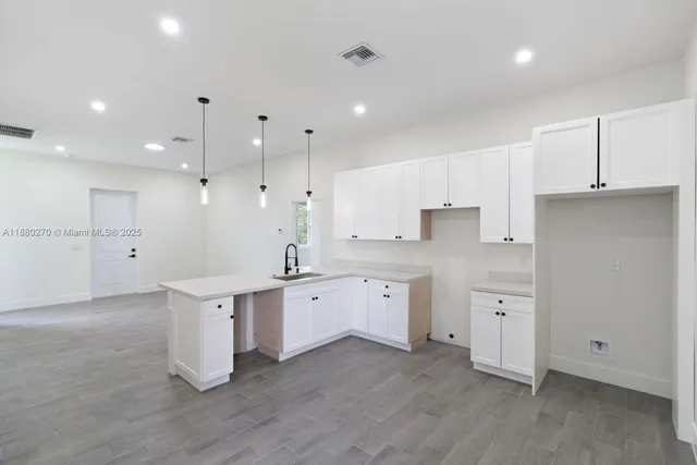 $319,000 | 710 Peacock Avenue, Lehigh Acres, FL 33974