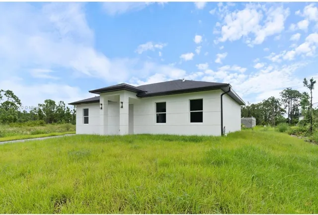 $319,000 | 710 Peacock Avenue, Lehigh Acres, FL 33974