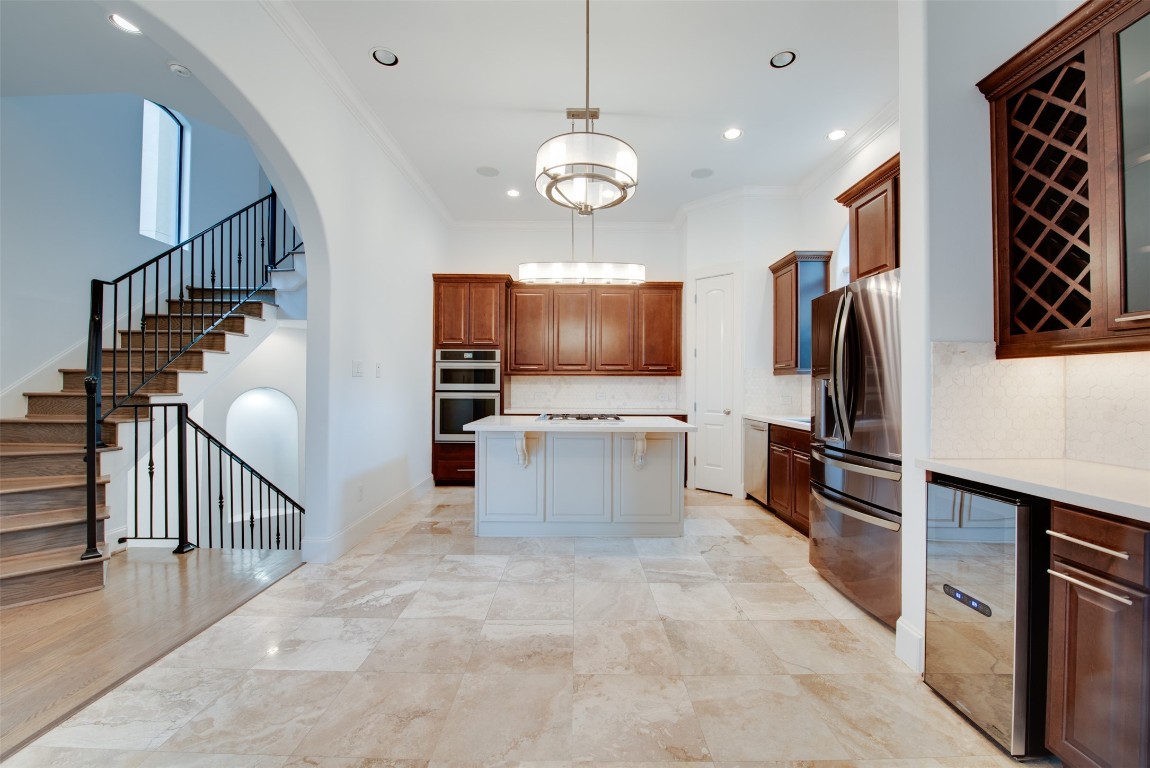 705 Malone Street, Unit B Houston, TX 77007 - Photo 1 of 39 a view of a kitchen with microwave and refrigerator