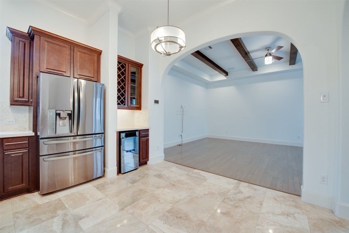 705 Malone Street, Unit B Houston, TX 77007 - Photo 12 of 39 a kitchen with stainless steel appliances granite countertop a refrigerator a stove a sink and dishwasher
