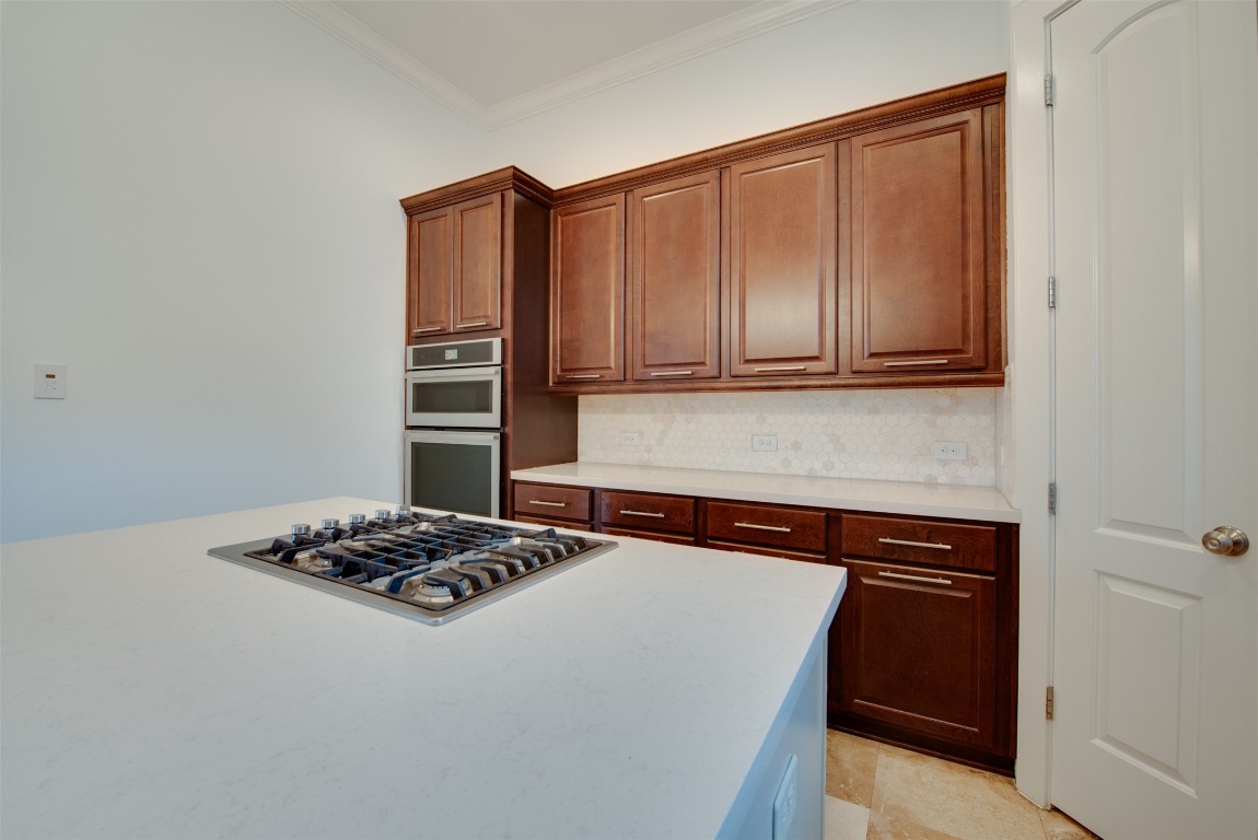 705 Malone Street, Unit B Houston, TX 77007 - Photo 14 of 39 a kitchen with a stove and a refrigerator