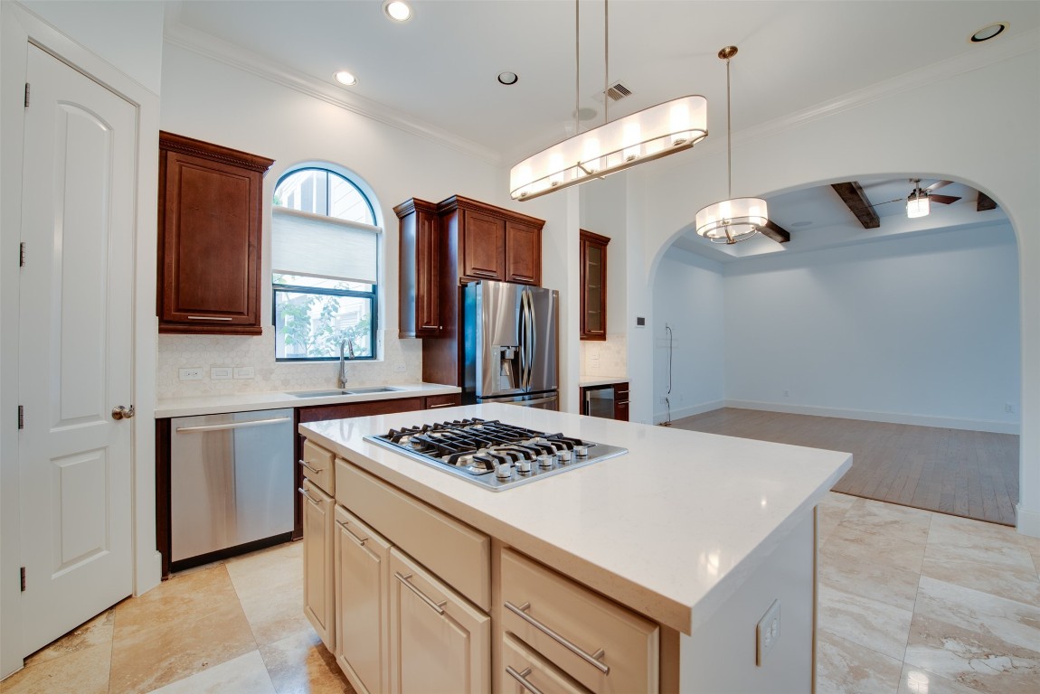 705 Malone Street, Unit B Houston, TX 77007 - Photo 16 of 39 a kitchen that has a cabinets and a stove