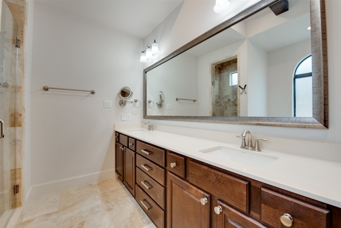 705 Malone Street, Unit B Houston, TX 77007 - Photo 36 of 39 a bathroom with a sink and a mirror