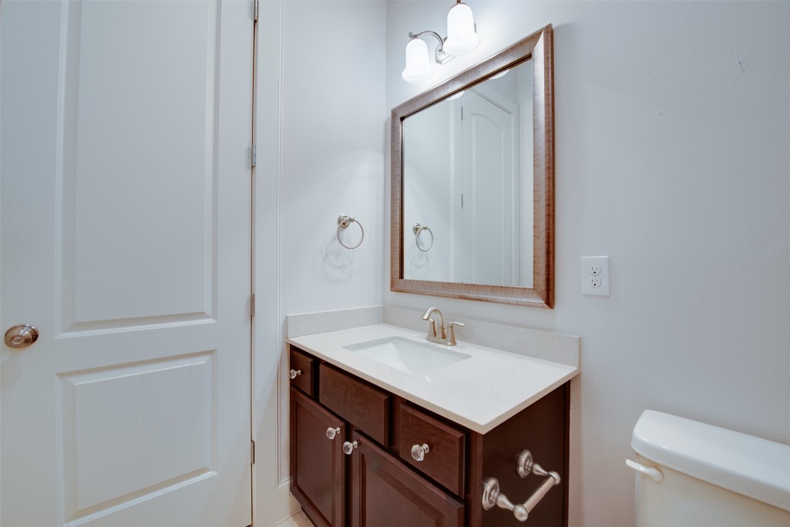 705 Malone Street, Unit B Houston, TX 77007 - Photo 6 of 39 a bathroom with a sink vanity and a mirror