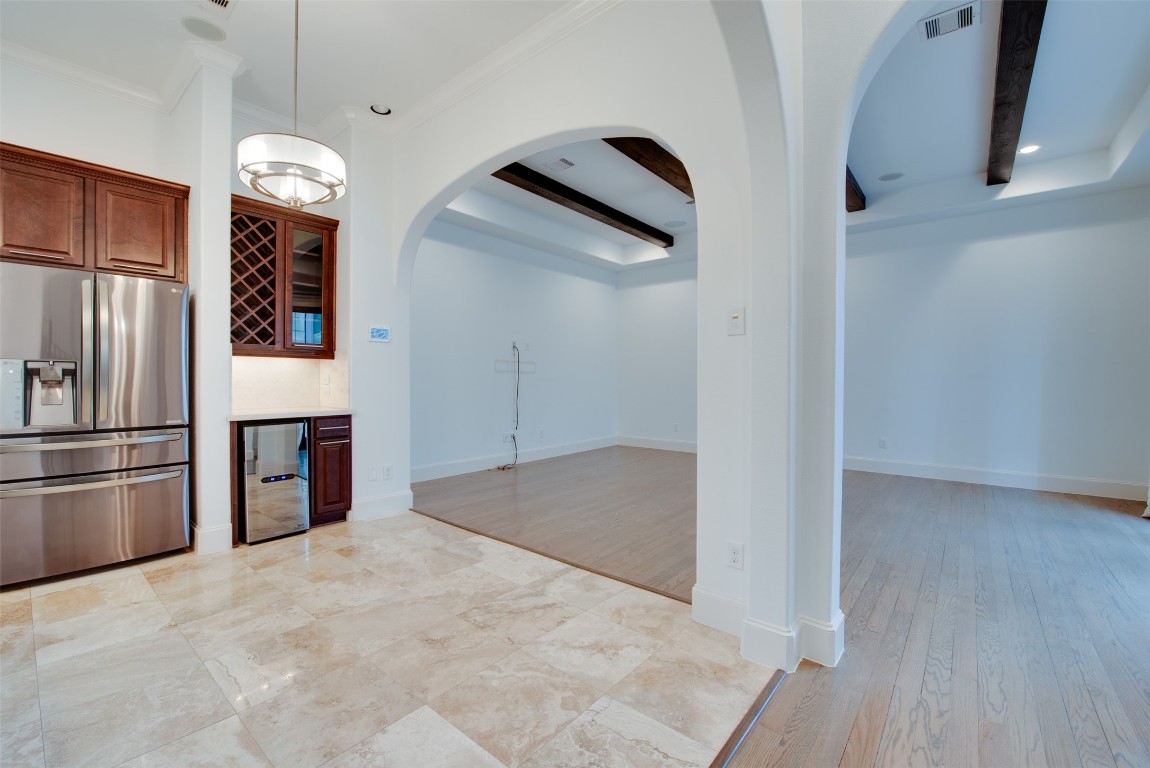 705 Malone Street, Unit B Houston, TX 77007 - Photo 8 of 39 a view of a kitchen with a sink and refrigerator