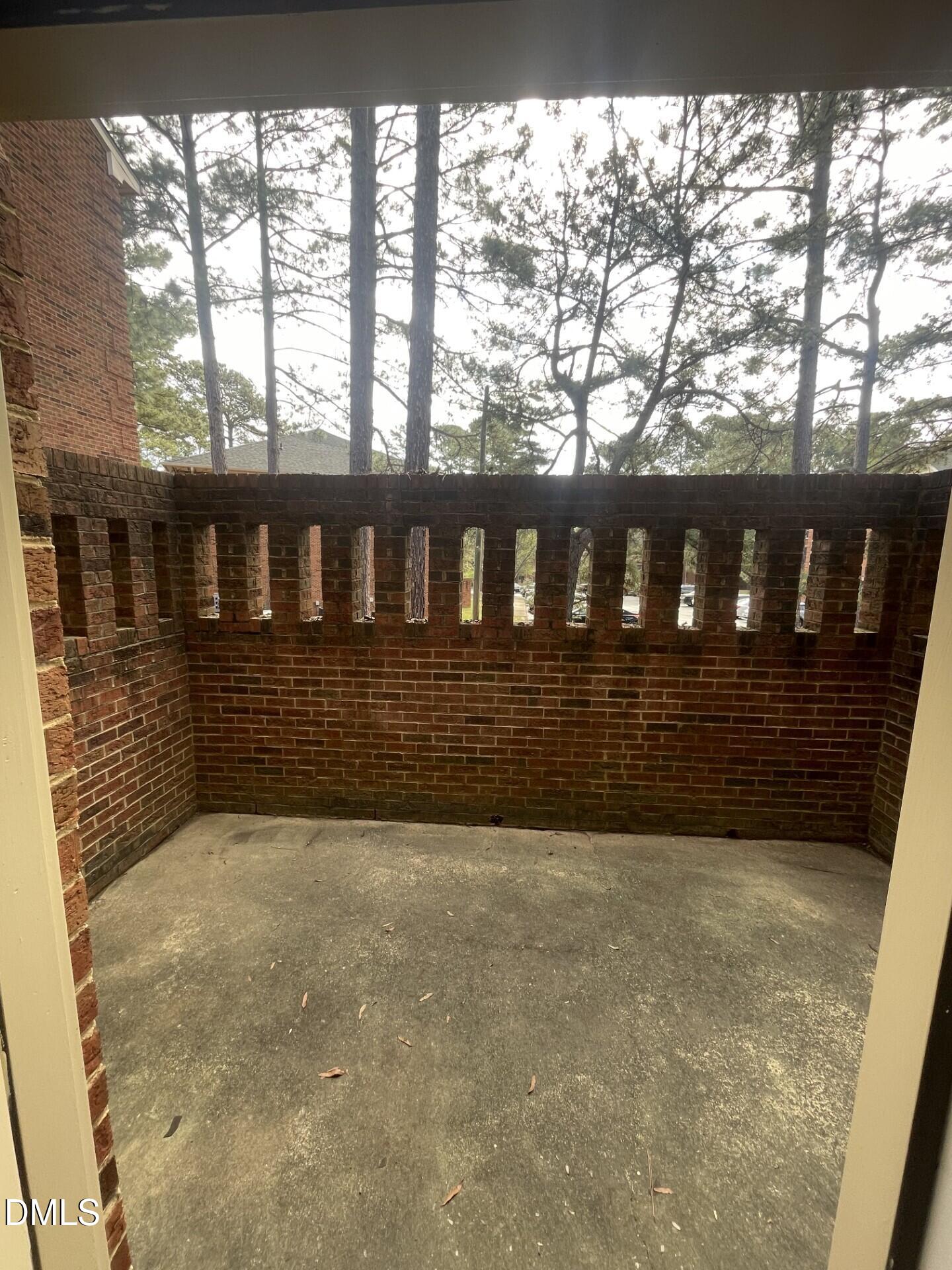 3535 Ivy Commons Drive, Unit 102 Raleigh, NC 27606 - Photo 9 of 9 a view of wooden door