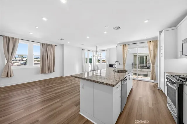a view of a living room with a flat screen tv