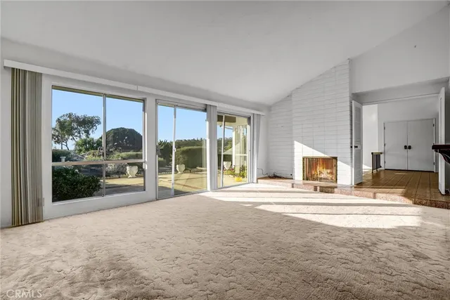 a kitchen that has a lot of cabinets in it