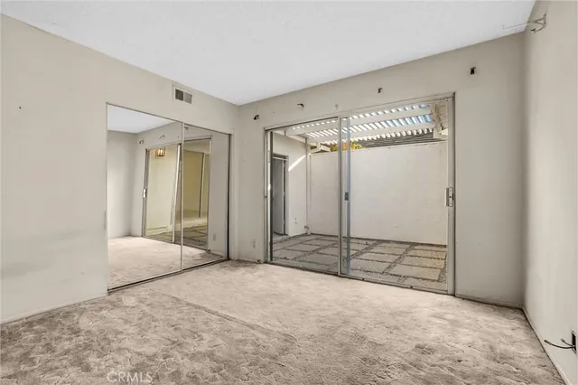 a swimming pool with outdoor seating and yard