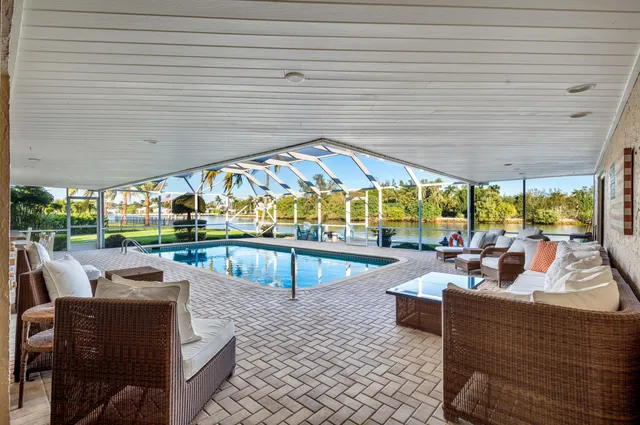 a view of a patio with swimming pool