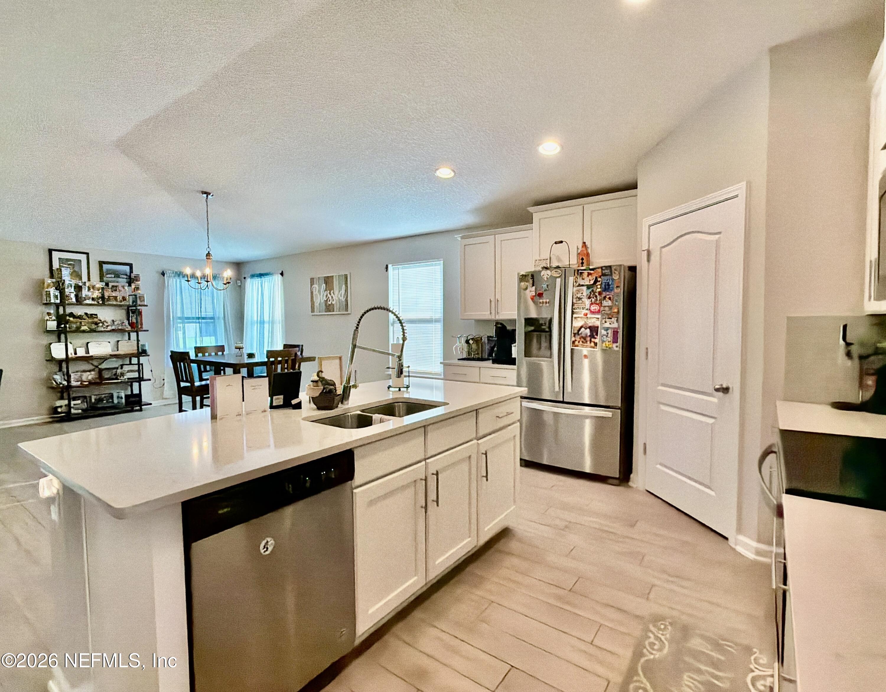 3166 Spotted Bass Lane Jacksonville, FL 32226 - Photo 6 of 27 5 Kitchen - Dining
