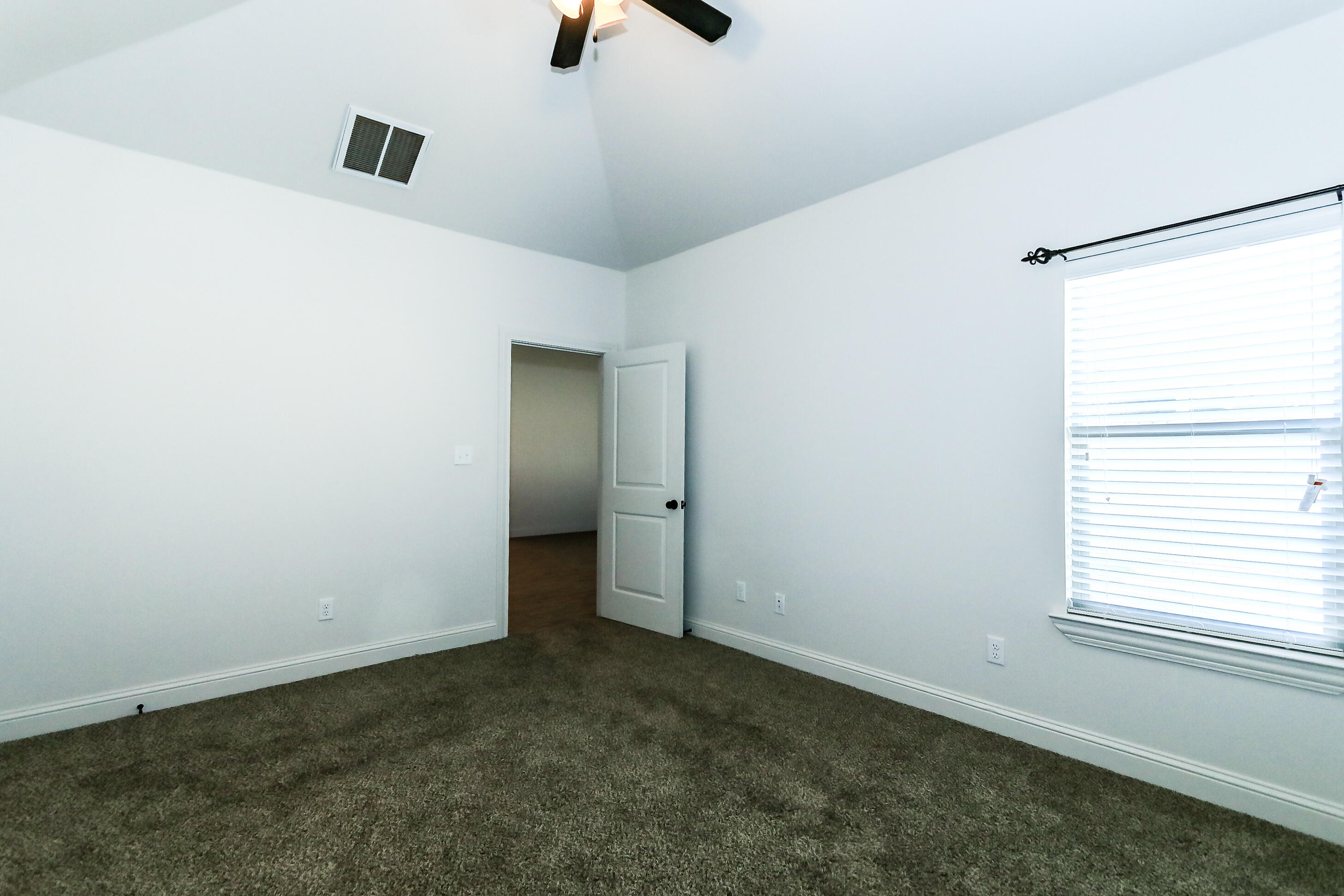 2518 B 111th Street Lubbock, TX 79423 - Photo 18 of 23 an empty room with a window