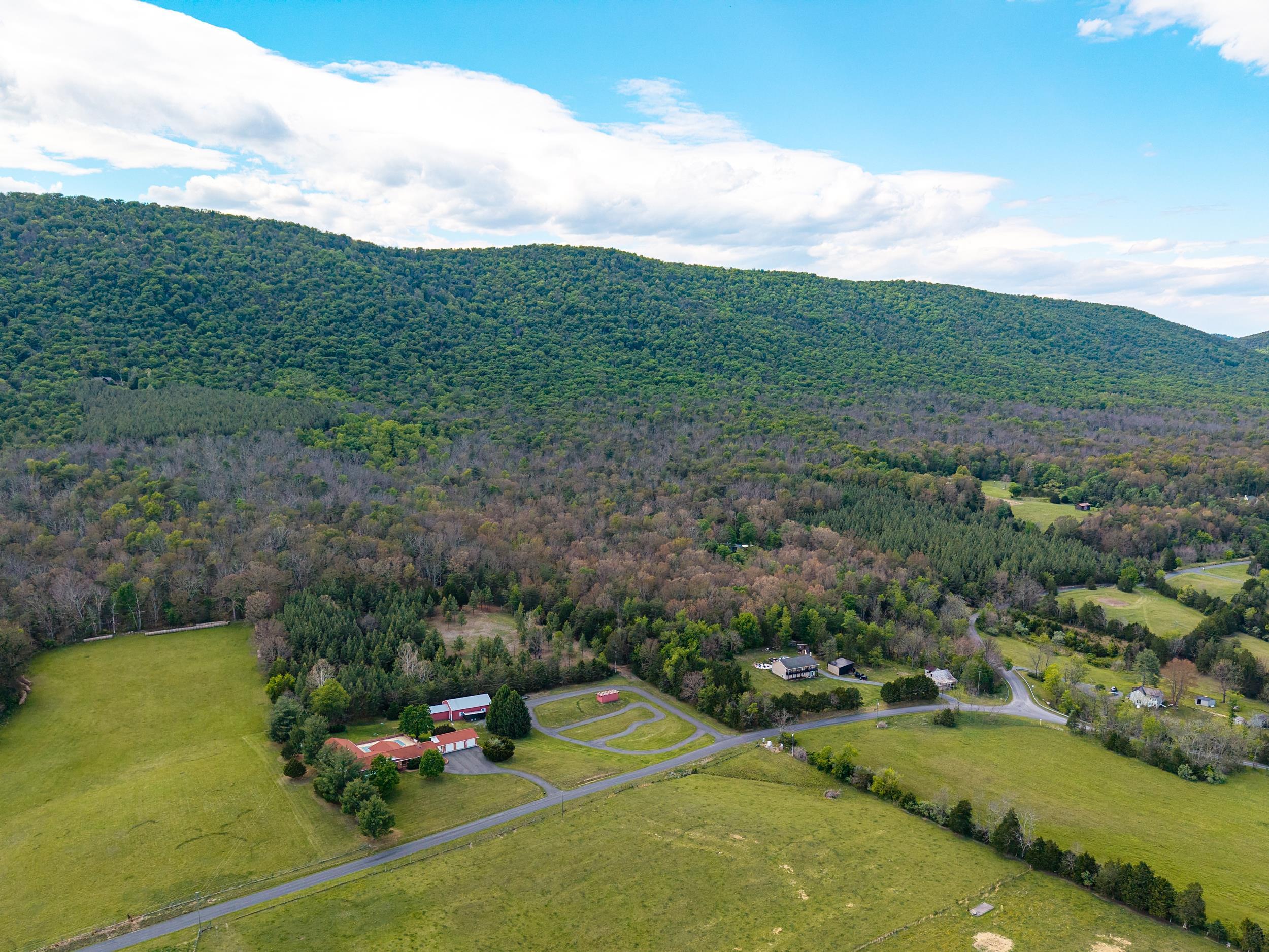 0 Boliver Road Fort Valley, VA 22652 - Photo 10 of 55 a view of a town with mountains in the background