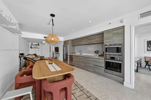 a kitchen with a sink and stove