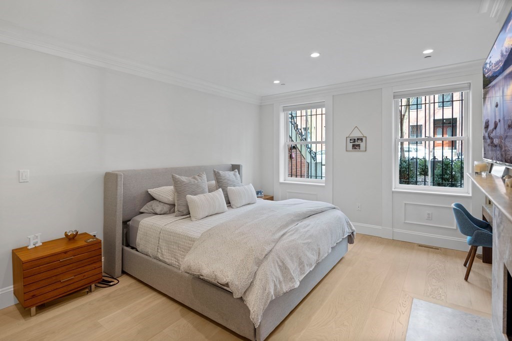 192 West Springfield Street, Unit 1 Boston, MA 02118 - Photo 15 of 26 a bedroom with a bed and a window