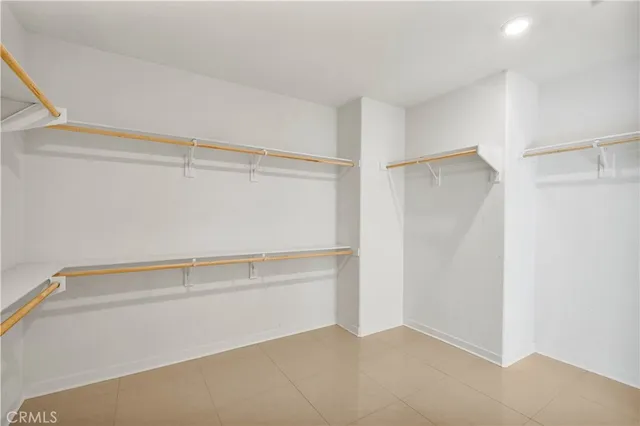 a view of an empty walk in closet