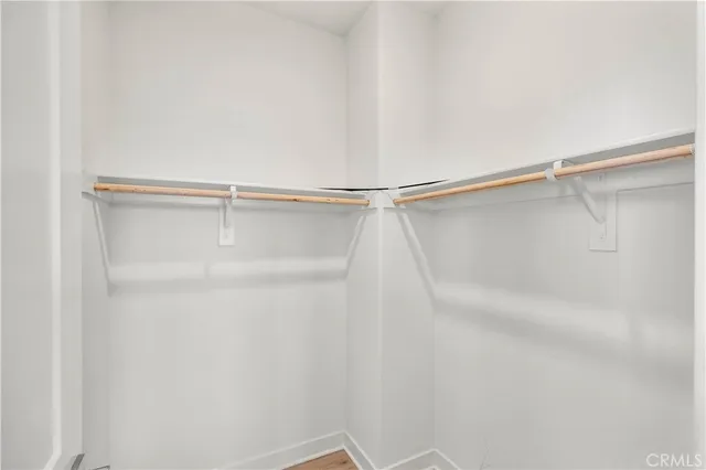 a view of storage and utility room with washer and dryer