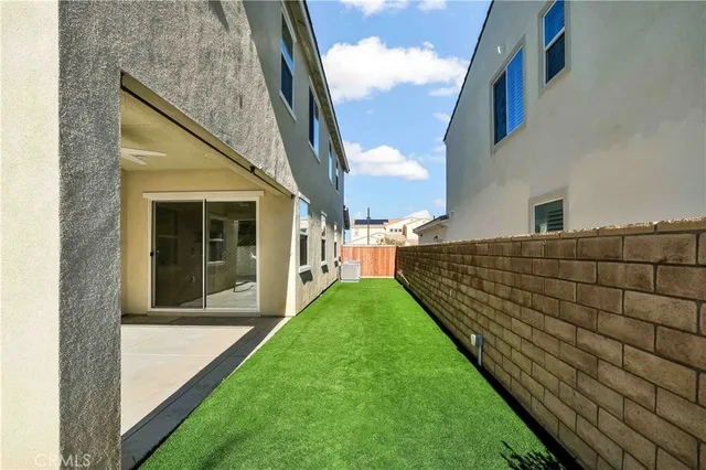 a view of an chairs and tables in the patio