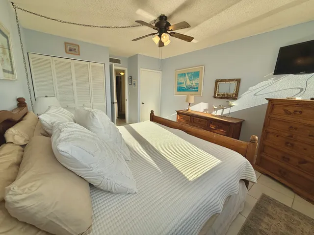 an outdoor space with patio and barbeque oven