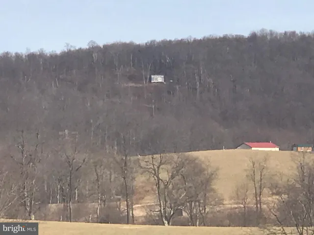 a view of a porch with furniture