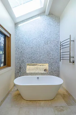 a view of a bathtub in a bathroom