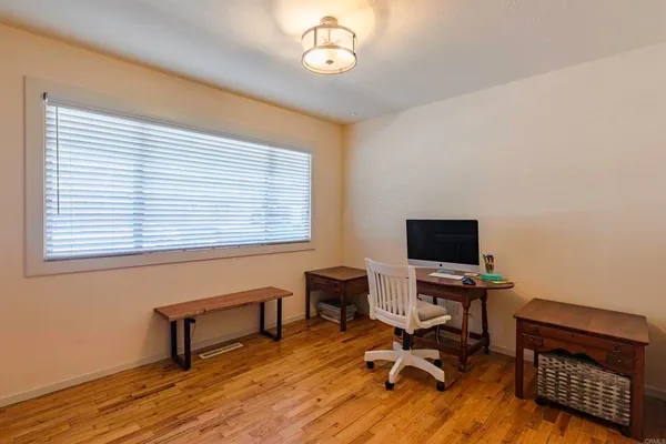 a room with furniture and a window