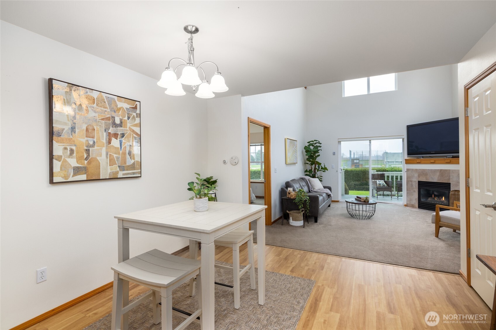 1182 Decatur Circle, Unit 7A Burlington, WA 98233 - Photo 13 of 36 a view of a dining room with furniture window and wooden floor
