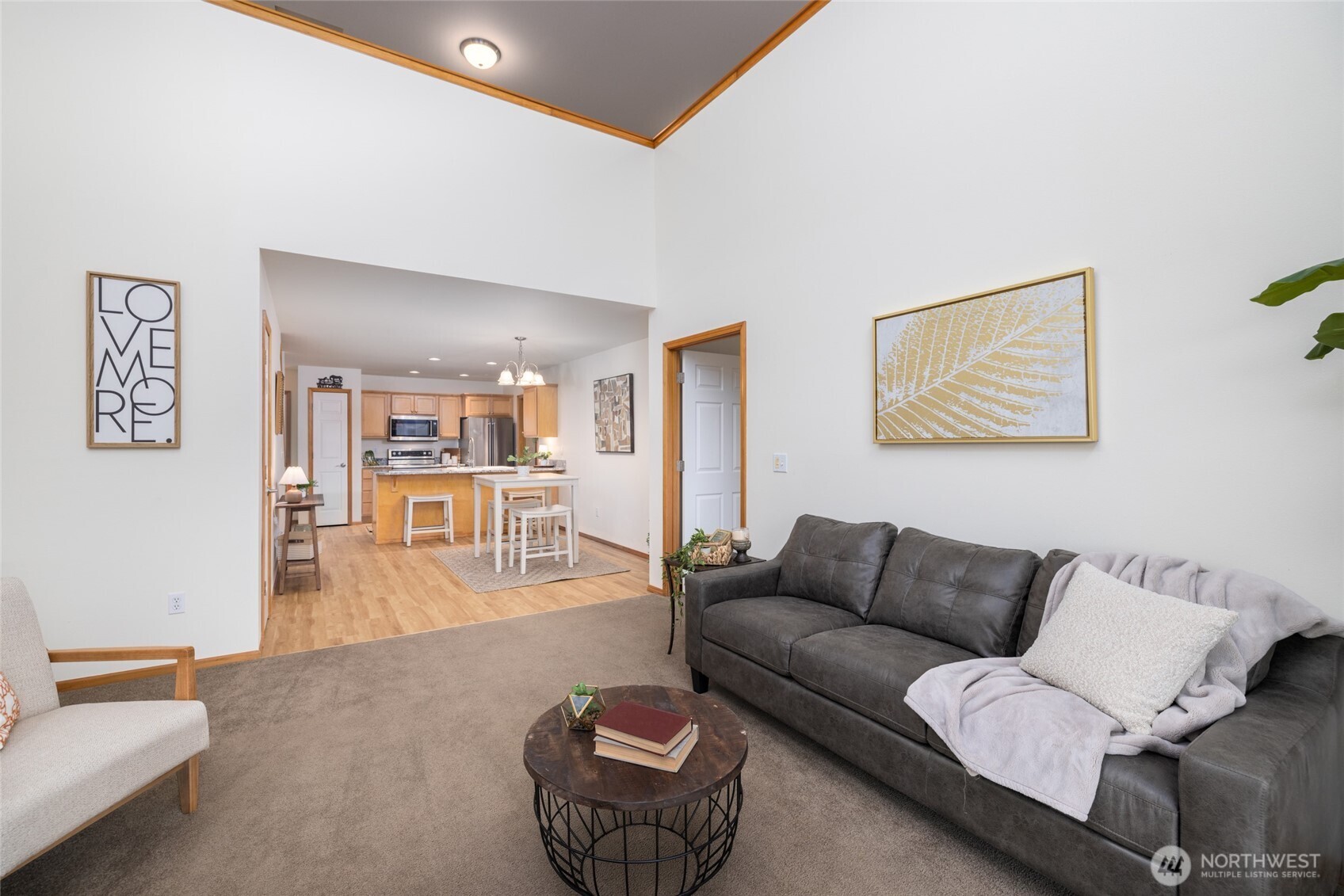 1182 Decatur Circle, Unit 7A Burlington, WA 98233 - Photo 17 of 36 a living room with furniture and wooden floor