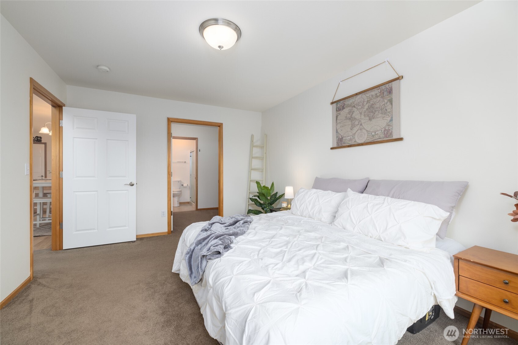 1182 Decatur Circle, Unit 7A Burlington, WA 98233 - Photo 20 of 36 a large white bed in a white room
