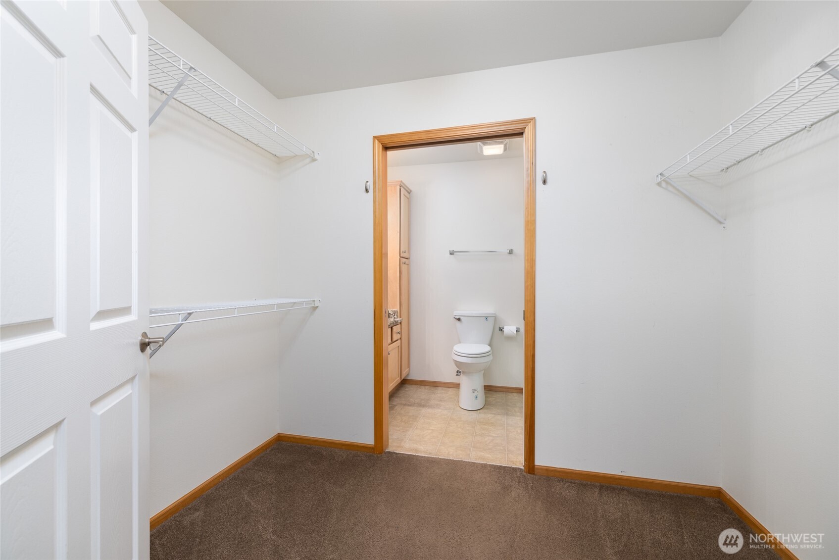 1182 Decatur Circle, Unit 7A Burlington, WA 98233 - Photo 21 of 36 a bathroom with a granite countertop toilet and a sink
