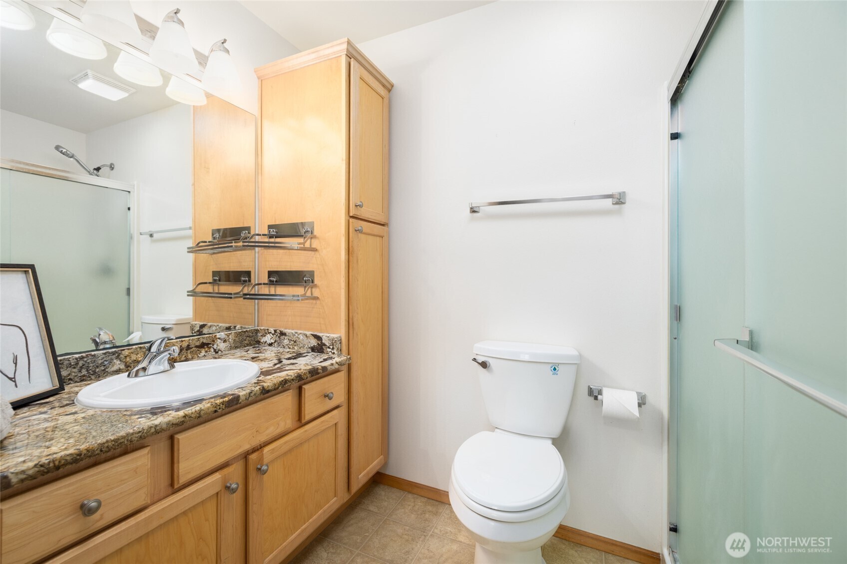 1182 Decatur Circle, Unit 7A Burlington, WA 98233 - Photo 22 of 36 a bathroom with a granite countertop sink toilet and shower