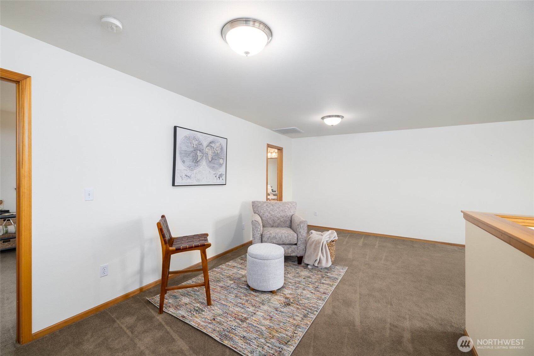 1182 Decatur Circle, Unit 7A Burlington, WA 98233 - Photo 23 of 36 a living room with furniture and a table