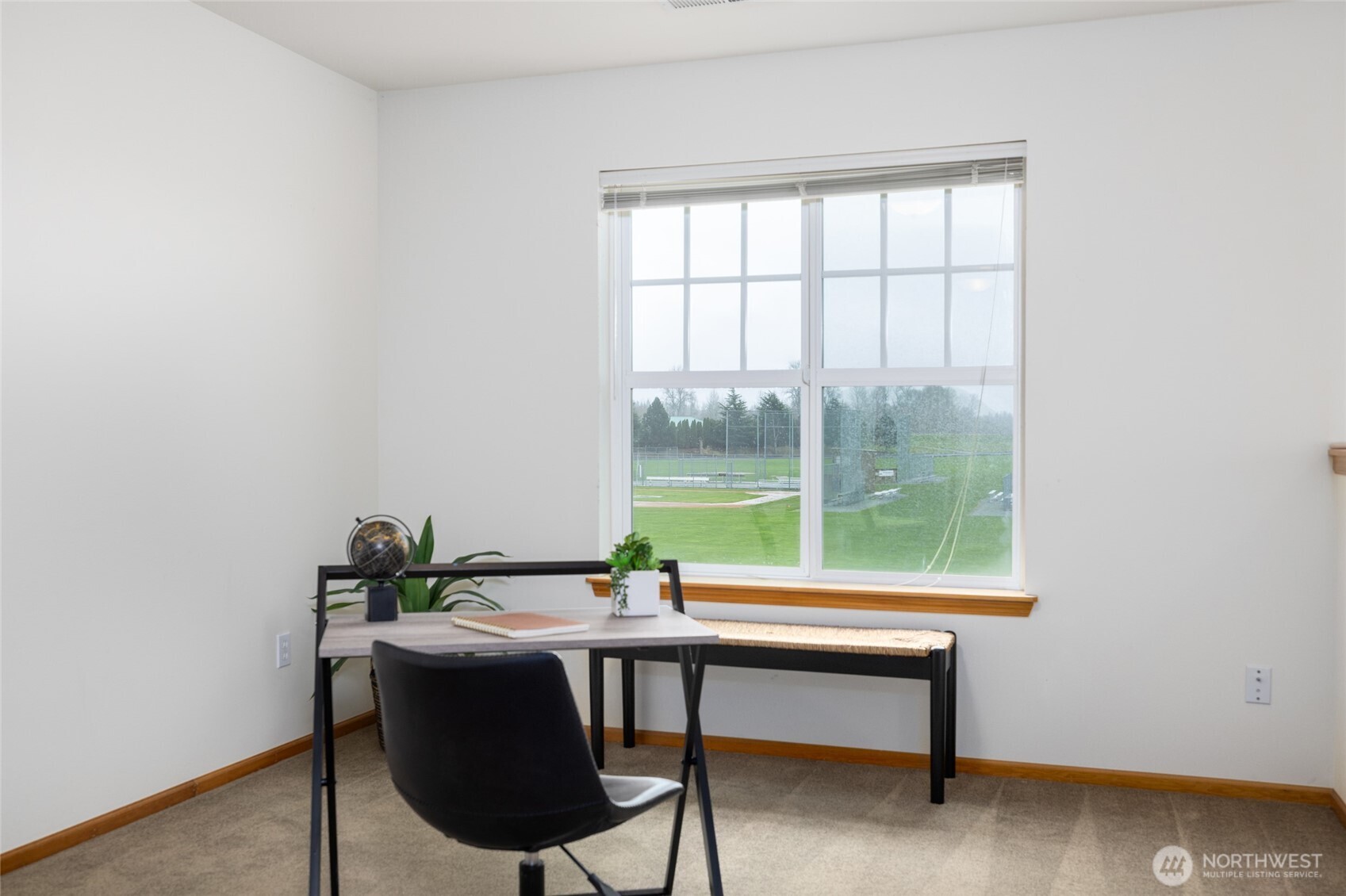 1182 Decatur Circle, Unit 7A Burlington, WA 98233 - Photo 26 of 36 a view of a work space with wooden floor and a potted plant