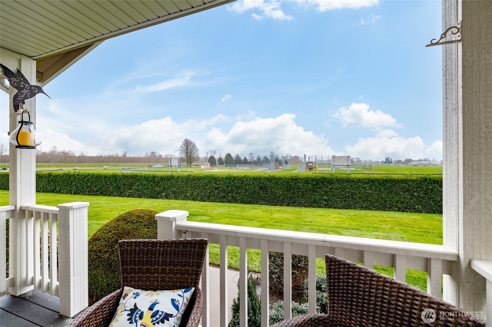1182 Decatur Circle, Unit 7A Burlington, WA 98233 - Photo 3 of 36 a view of a balcony with an ocean
