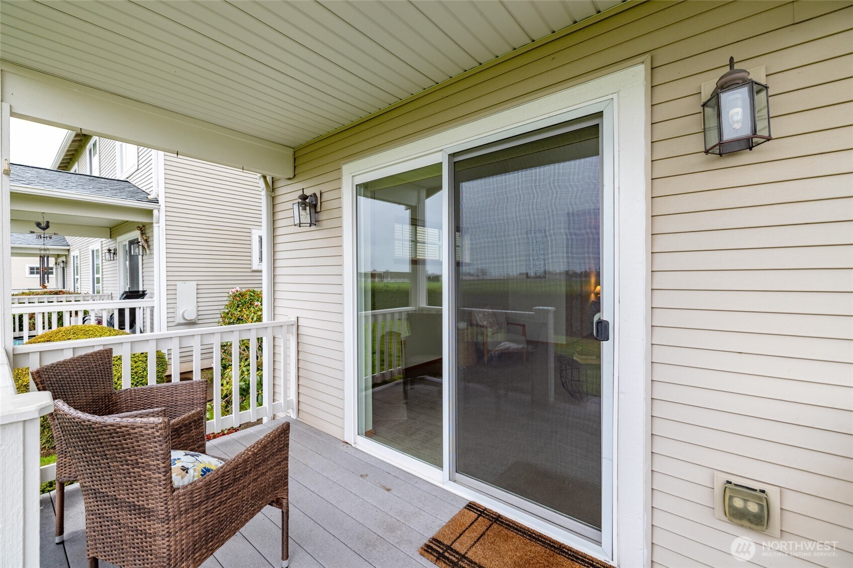 1182 Decatur Circle, Unit 7A Burlington, WA 98233 - Photo 33 of 36 a view of a balcony with furniture