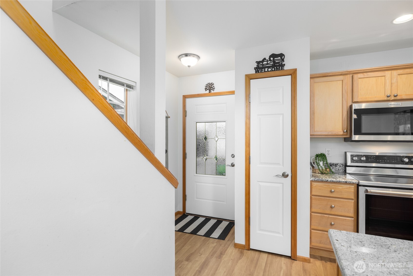 1182 Decatur Circle, Unit 7A Burlington, WA 98233 - Photo 4 of 36 a view of a kitchen from the hallway