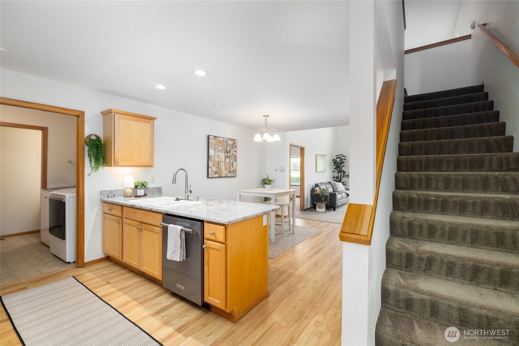 1182 Decatur Circle, Unit 7A Burlington, WA 98233 - Photo 5 of 36 a view of living room with granite countertop furniture and fireplace