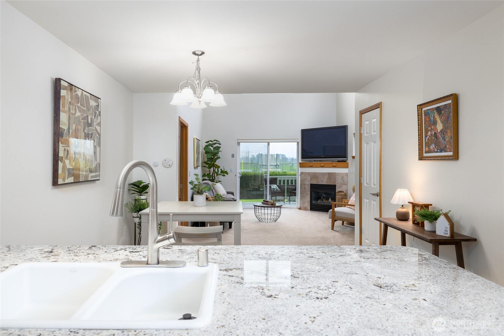 1182 Decatur Circle, Unit 7A Burlington, WA 98233 - Photo 9 of 36 a living room with fireplace furniture and a flat screen tv