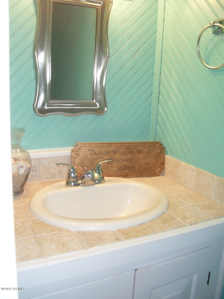 888 Queens Creek Road Hubert, NC 28539 - Photo 16 of 19 Upgraded Tile Half Bath