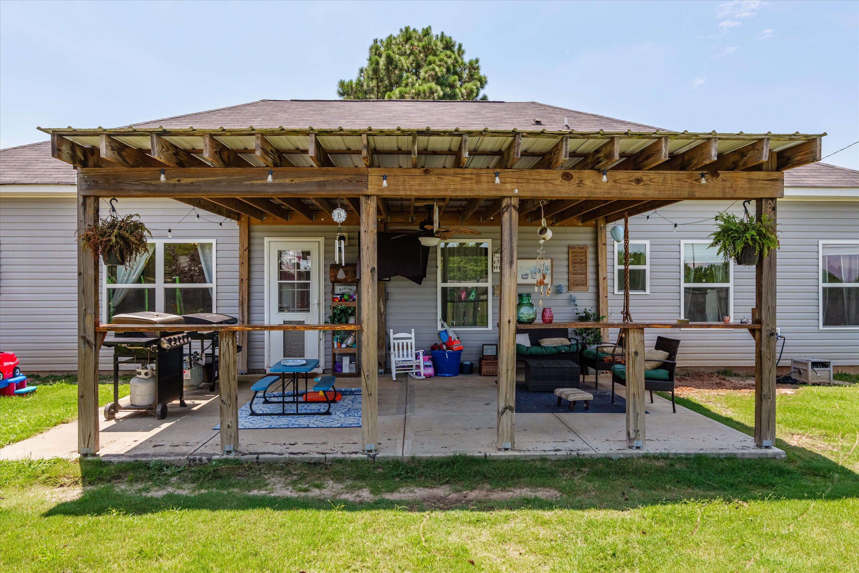 125 Macedonia Road North Augusta, SC 29860 - Photo 27 of 41 Over half an acre of space! Yard is privacy fenced with additional fenced area for the above ground pool. Yard provides AMPLE space for your backyard dreams.