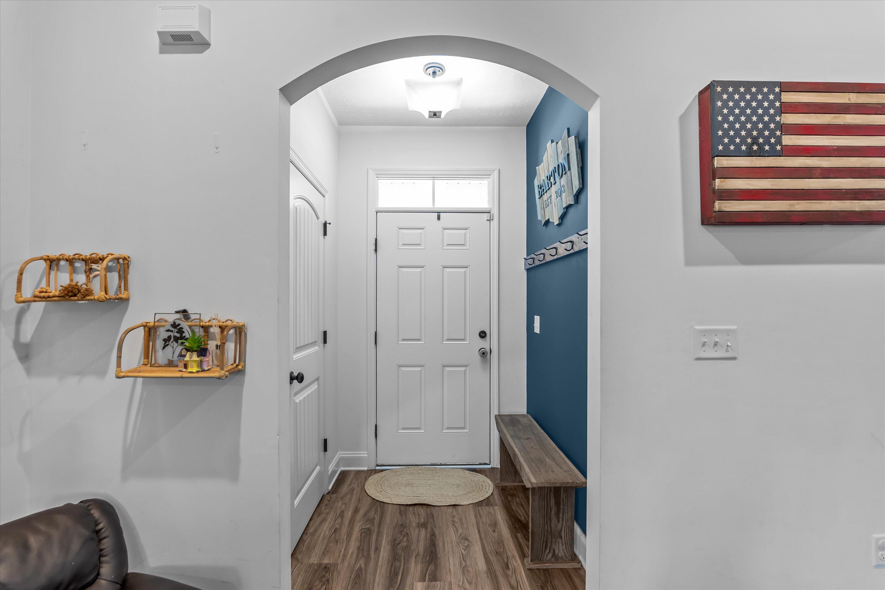 125 Macedonia Road North Augusta, SC 29860 - Photo 5 of 41 Entryway with coat closet and arched doorway