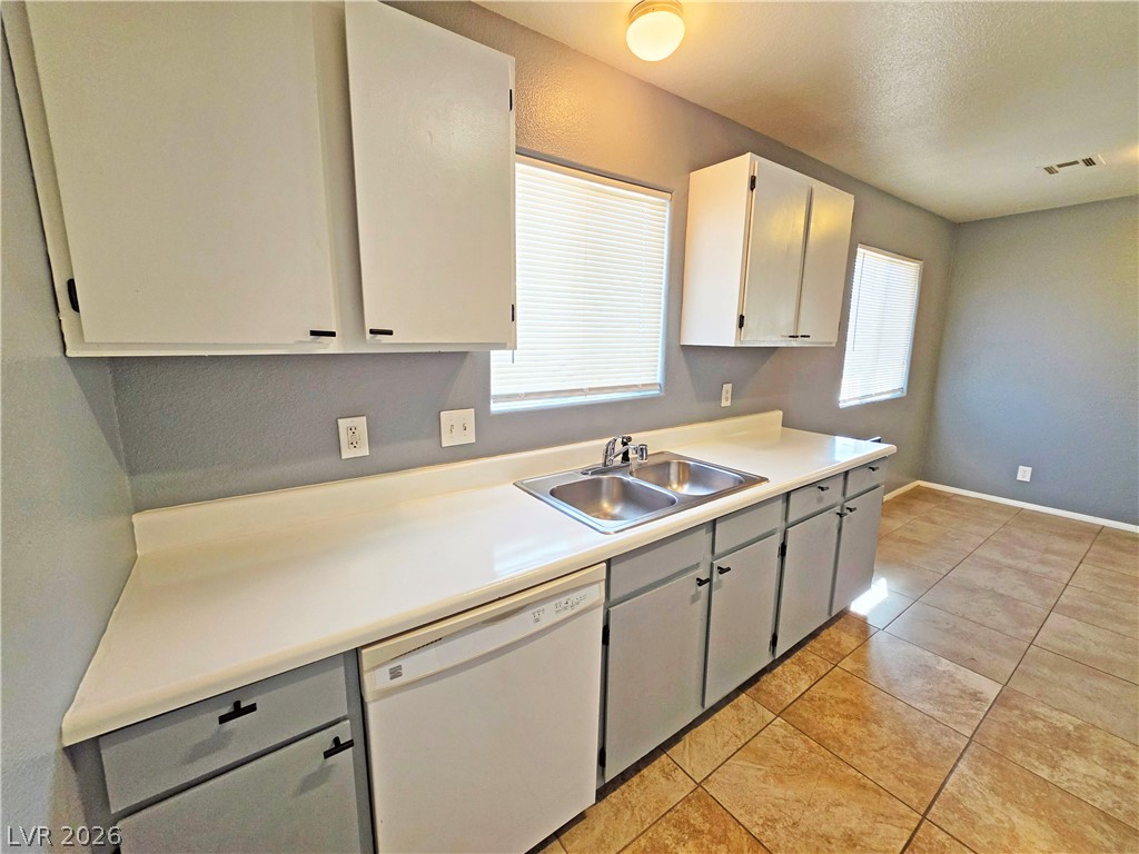1444 Star Road, Unit 3 Pahrump, NV 89048 - Photo 23 of 35 Functional kitchen with ample counter space and storage, ready for culinary endeavors.