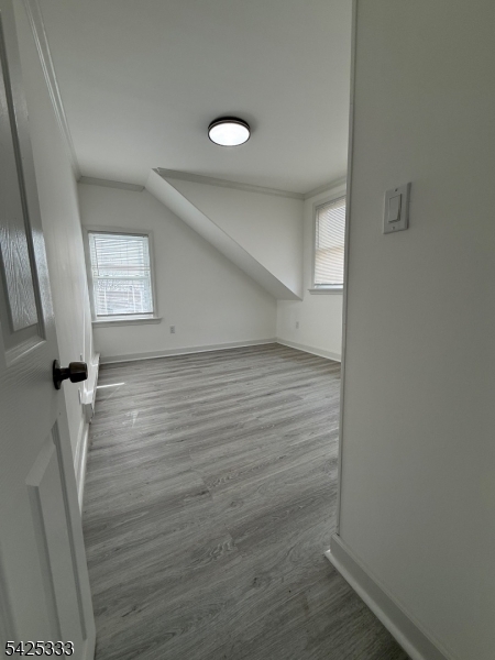 124 Stone Street, Unit 3 Newark, NJ 07104 - Photo 5 of 10 wooden floor in an empty room