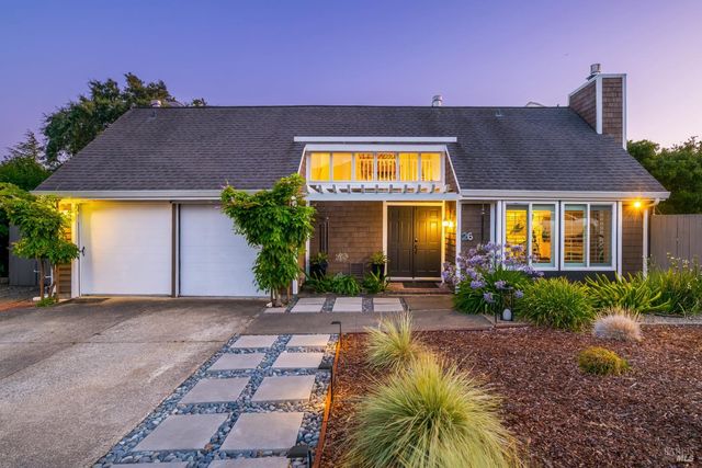 a view of a house with basketball court