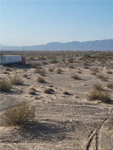 a view of ocean and mountain