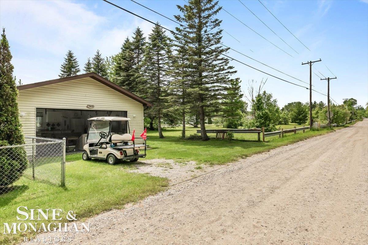 7405 Birchtree Road Lexington, MI 48450 - Photo 25 of 29 Garage Entrance and additional parking off Beechwood Rd.