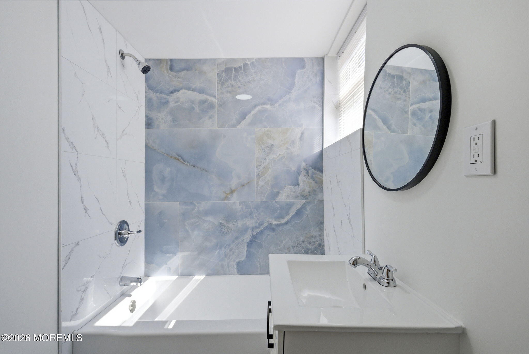 23 Beers Street Keyport, NJ 07735 - Photo 32 of 51 a bathroom with a sink a mirror and a shower