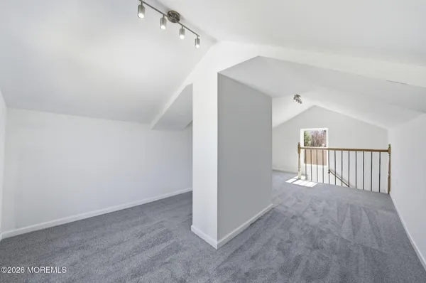 a view of a room with an empty space
