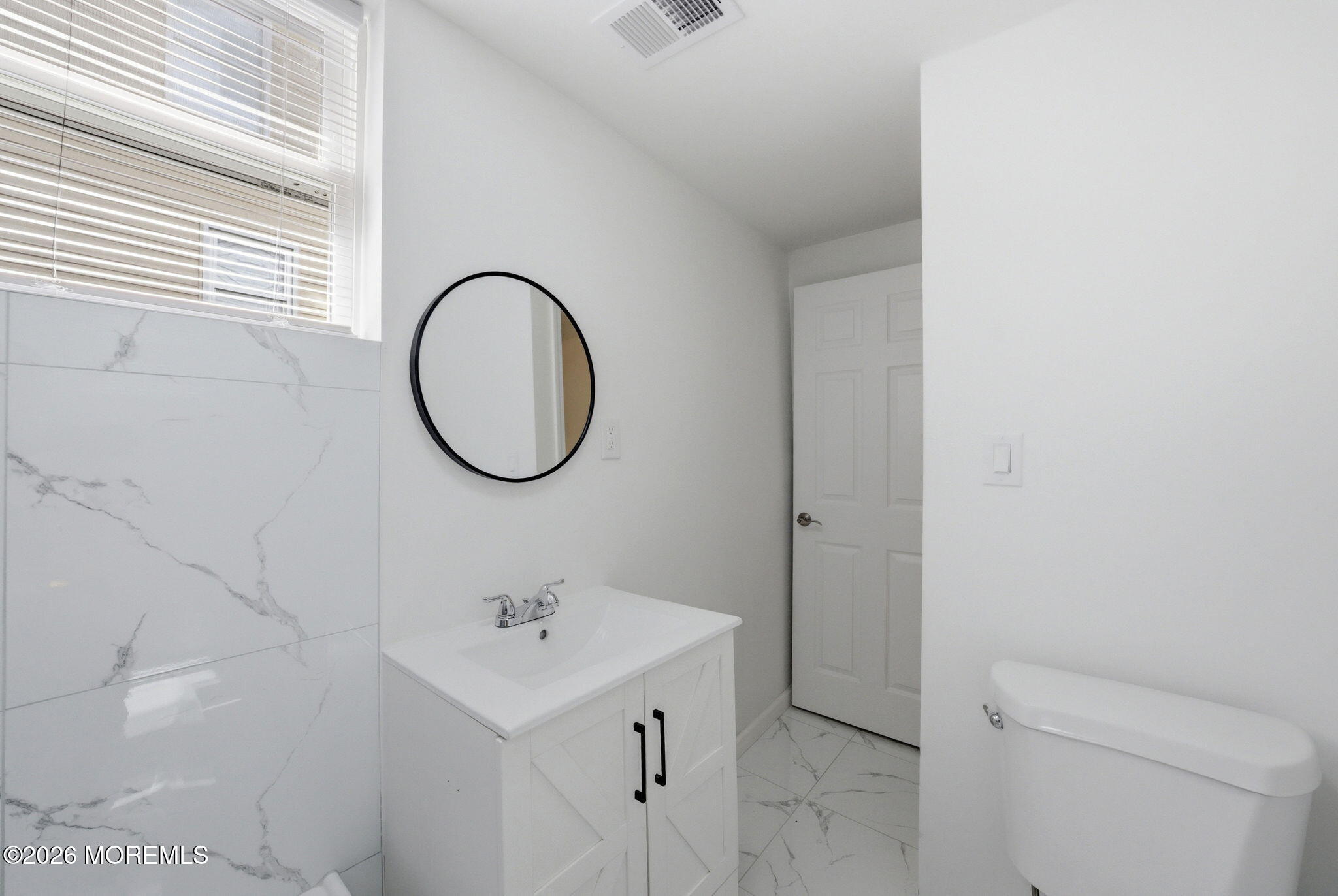 23 Beers Street Keyport, NJ 07735 - Photo 37 of 51 a bathroom with a sink and a mirror