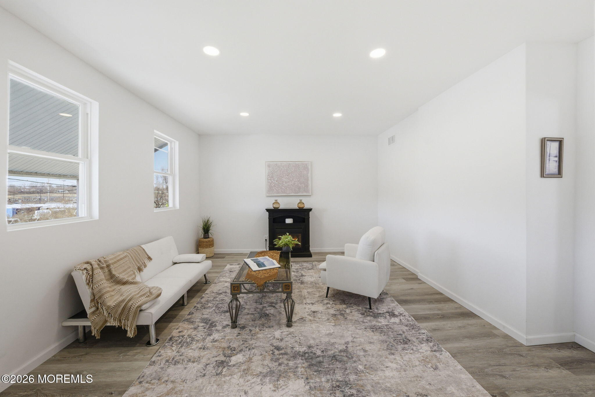 23 Beers Street Keyport, NJ 07735 - Photo 4 of 51 a living room with furniture a fireplace and a window